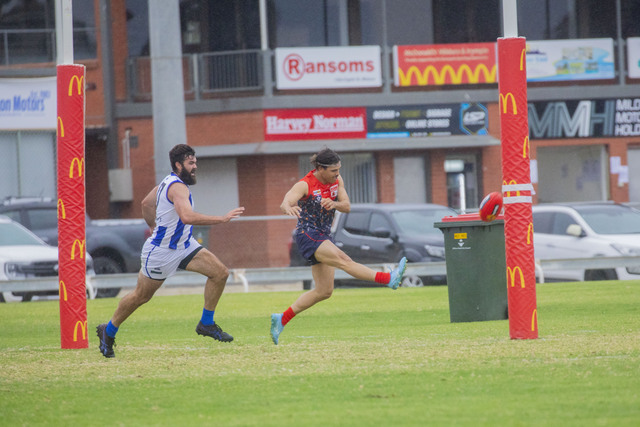 Brown blows Kangas away
